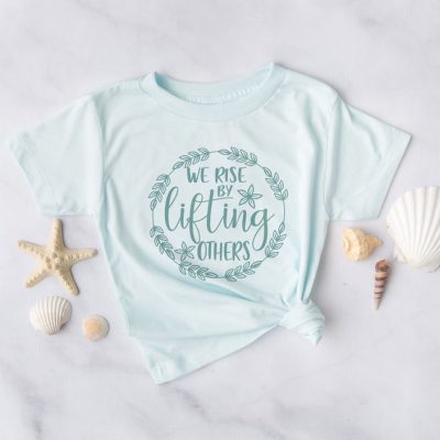 We Rise By Lifting Others - Wreath Unisex T-Shirt
